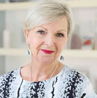 Older woman expressing satisfaction with her healthy lifestyle and daily routine experience